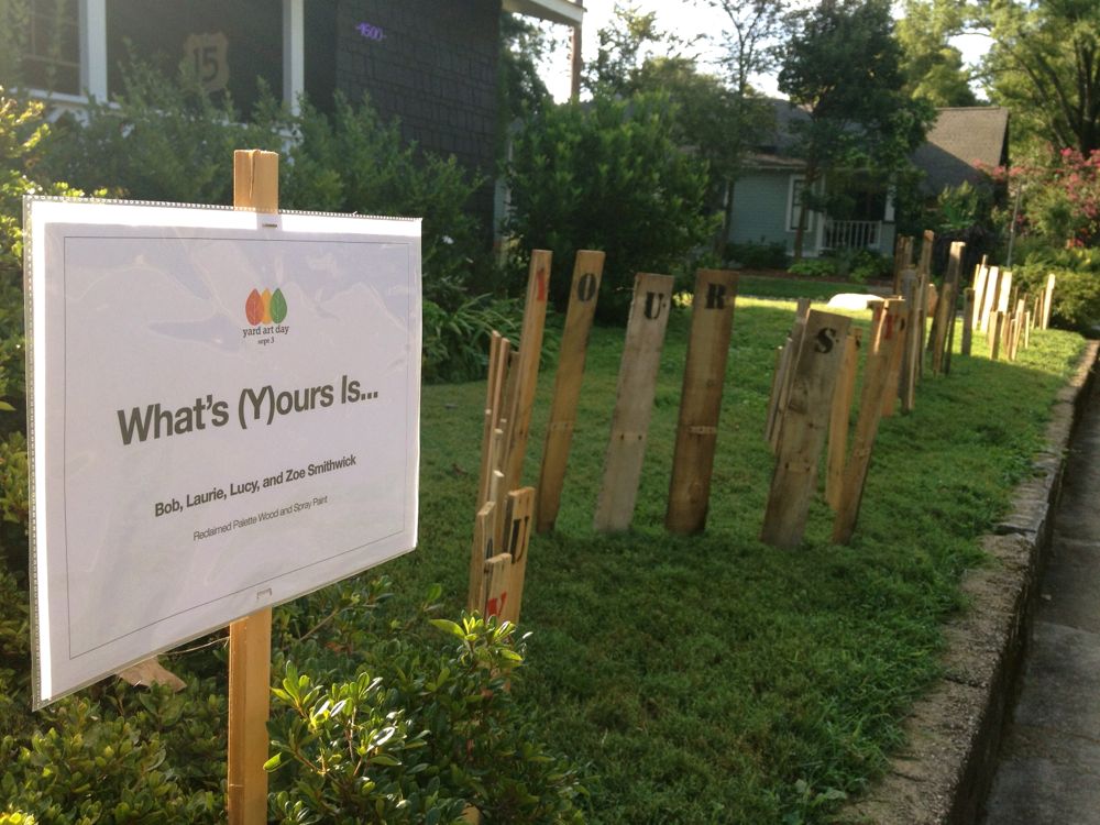 Original art created by Laurie Smithwick (and family) for Yard Art Day in Charlotte, NC. The piece is a riff on the picket fence that doesn't actually keep anyone out, called "What's (Y)Ours is..."