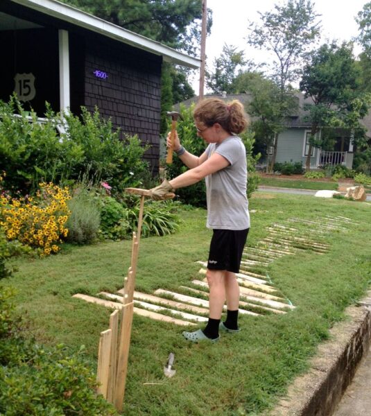 Original art created by Laurie Smithwick (and family) for Yard Art Day in Charlotte, NC. The piece is a riff on the picket fence that doesn't actually keep anyone out, called "What's (Y)Ours is..."