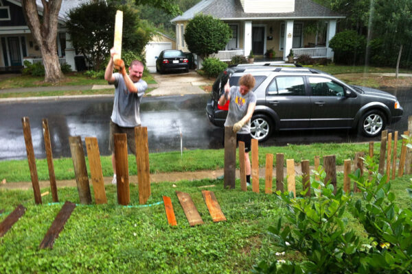 Original art created by Laurie Smithwick (and family) for Yard Art Day in Charlotte, NC. The piece is a riff on the picket fence that doesn't actually keep anyone out, called "What's (Y)Ours is..."