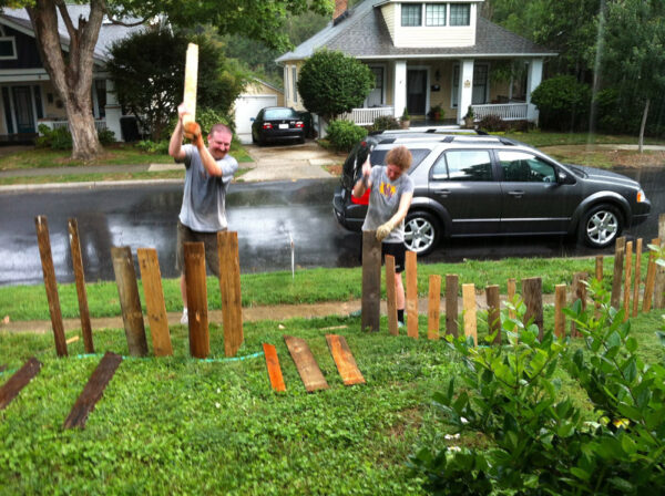 Original art created by Laurie Smithwick (and family) for Yard Art Day in Charlotte, NC. The piece is a riff on the picket fence that doesn't actually keep anyone out, called "What's (Y)Ours is..."